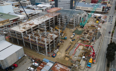 A building construction site in a city setting