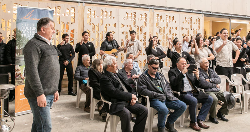 Minister Shane Jones in front of a waiata at the Hihiaua Cultural Centre.