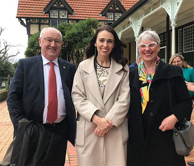 Robert Pigou, Jacinda Ardern, and Steve Chadwick in front of the Rotorua Museum.