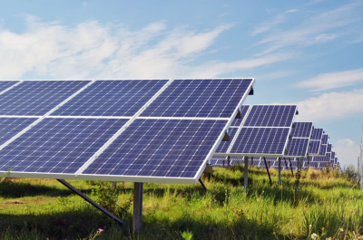 Row of solar panels standing in a feild